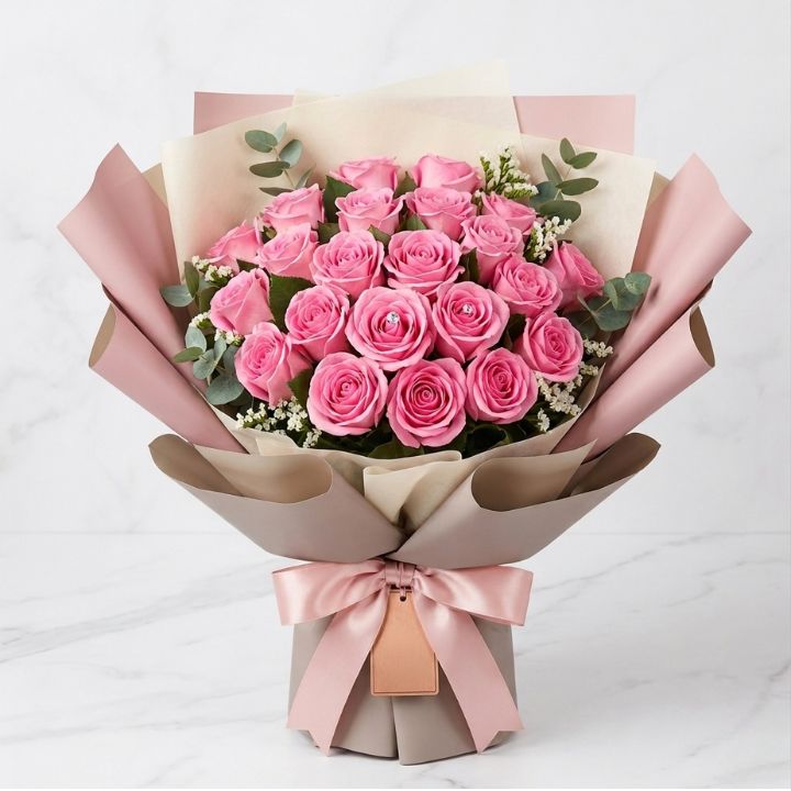 Luxury Pink Rose Elegance Bouquet 1 A flower beautiful pink rose bouquet arranged with fresh greenery in a luxury wrap.
