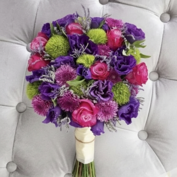 Pink Rose & Purple Lisianthus Birthday Bouquet 1 A hand-tied roses and lisianthus bouquet featuring vibrant pink roses and deep purple lisianthus with green accents.