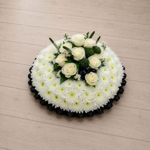 Elegant White Chrysanthemum and Cream Rose Posy Pad with green thistle and Speedwell spikes